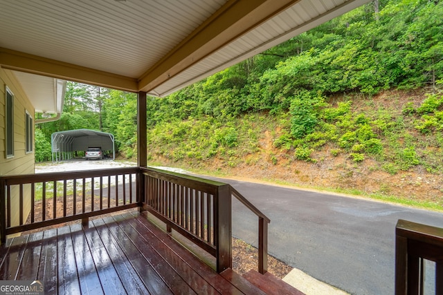 55 Cool Spring Ln, Clayton, GA 30525 - wooden terrace featuring a carport