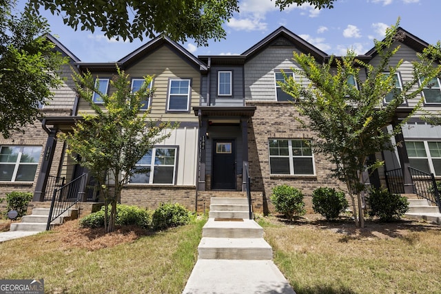 1004 Bayrose Cir, East Point, GA 30344 - view of front facade featuring brick siding and a front lawn