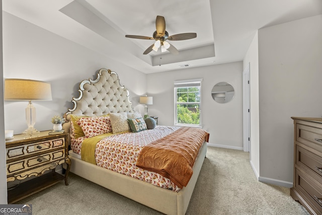 1004 Bayrose Cir, East Point, GA 30344 - bedroom with light carpet, a raised ceiling, and ceiling fan