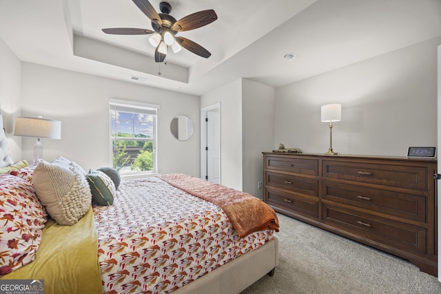 1004 Bayrose Cir, East Point, GA 30344 - bedroom featuring carpet, a raised ceiling, and a ceiling fan