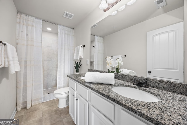 1004 Bayrose Cir, East Point, GA 30344 - bathroom featuring vanity, a tile shower, and tile patterned floors