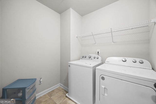 1004 Bayrose Cir, East Point, GA 30344 - washroom with washing machine and clothes dryer and baseboards