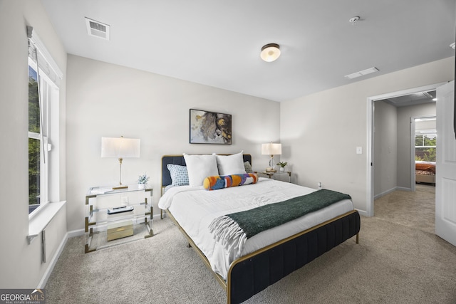 1004 Bayrose Cir, East Point, GA 30344 - bedroom featuring carpet flooring and baseboards