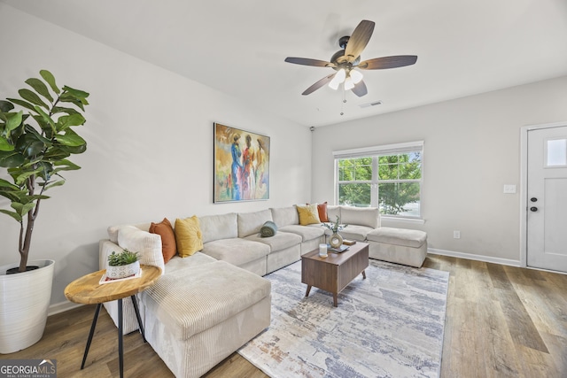 1004 Bayrose Cir, East Point, GA 30344 - living area with a ceiling fan and wood finished floors