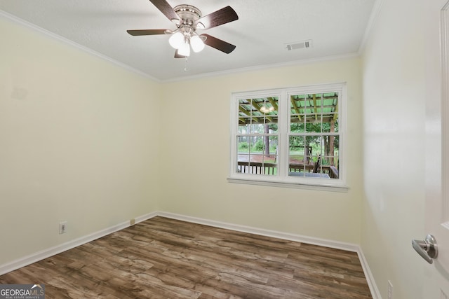 1469 Tabernacle Church Rd, Lincolnton, GA 30817 - unfurnished room with wood finished floors, ornamental molding, and a ceiling fan