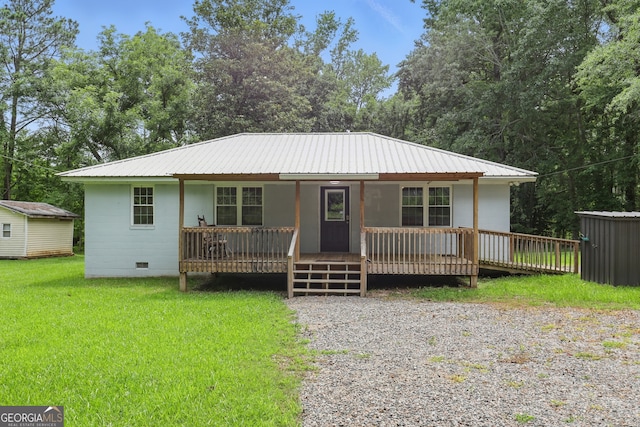1469 Tabernacle Church Rd, Lincolnton, GA 30817 - view of front of house featuring crawl space, a metal roof, a front lawn, and a porch