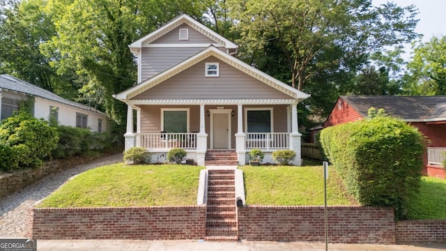 996 Palmetto Ave SW, Atlanta, GA 30314 - view of front of home featuring a porch and a front lawn