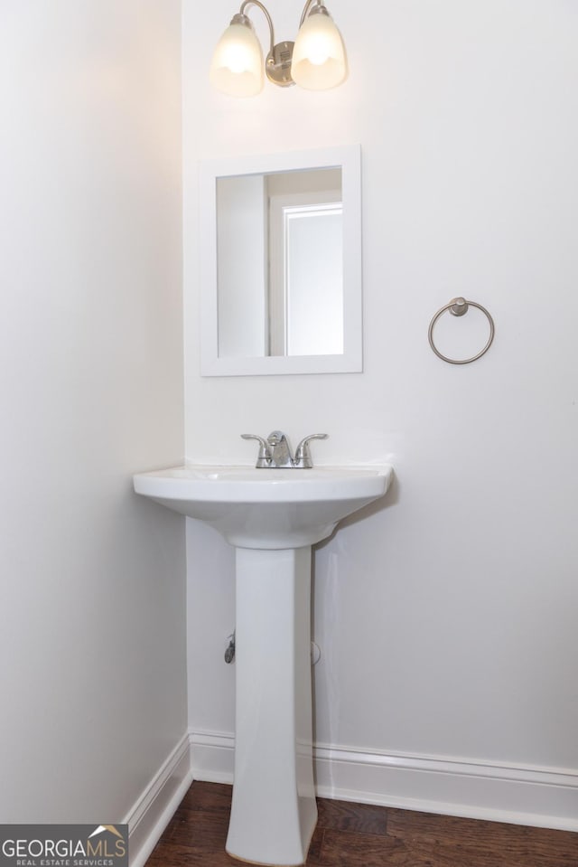 996 Palmetto Ave SW, Atlanta, GA 30314 - bathroom with a chandelier and wood finished floors