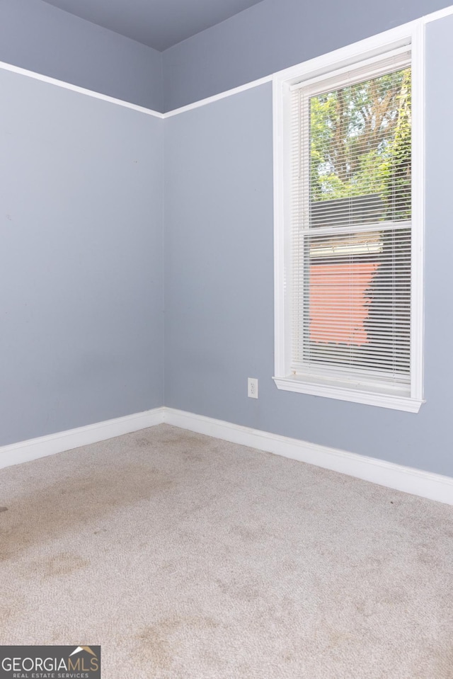 996 Palmetto Ave SW, Atlanta, GA 30314 - carpeted spare room with baseboards