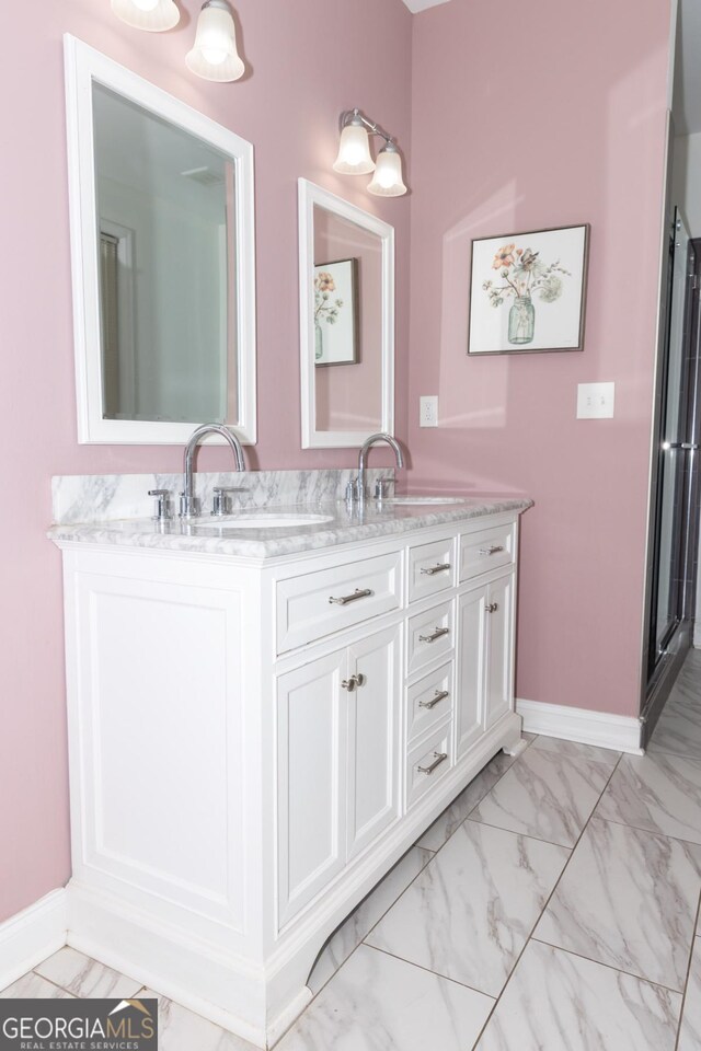 996 Palmetto Ave SW, Atlanta, GA 30314 - full bathroom with double vanity and marble finish flooring