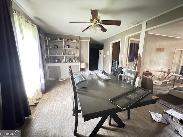 3109 Imperial Dr, Macon, GA 31211 - dining room featuring plenty of natural light, ornamental molding, a ceiling fan, wood finished floors, and wooden walls