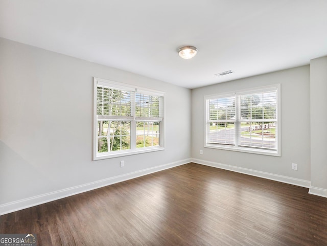 9701 Davis St, Braselton, GA 30517 - spare room featuring dark wood finished floors