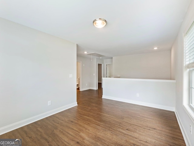 9701 Davis St, Braselton, GA 30517 - spare room with attic access and wood finished floors