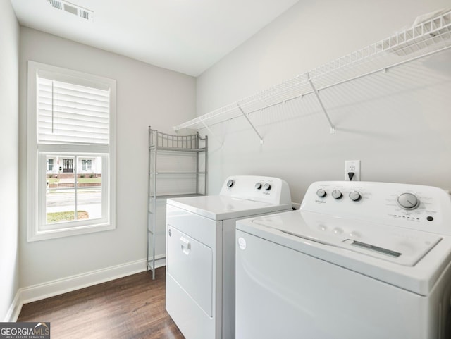 9701 Davis St, Braselton, GA 30517 - washroom with separate washer and dryer and dark wood finished floors