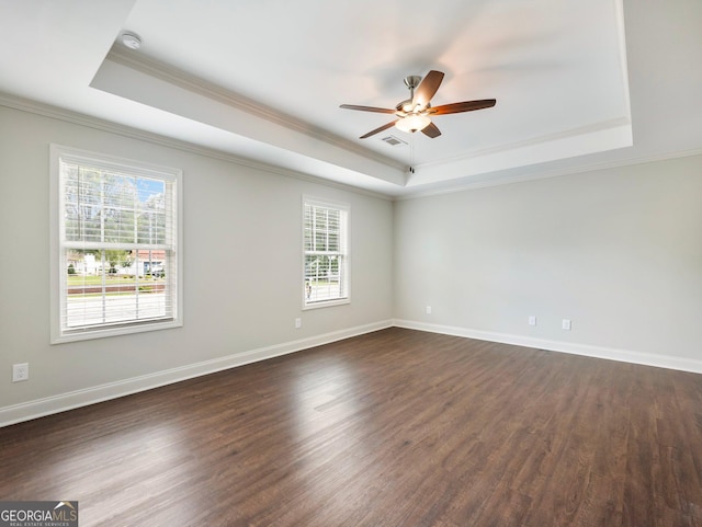 9701 Davis St, Braselton, GA 30517 - spare room with a tray ceiling, crown molding, ceiling fan, and healthy amount of natural light
