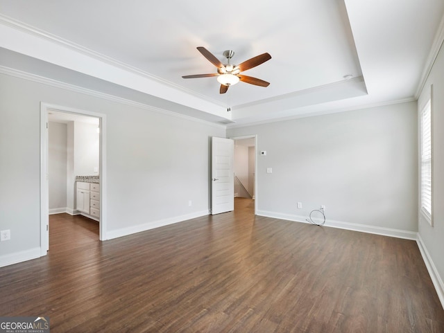 9701 Davis St, Braselton, GA 30517 - empty room with a raised ceiling, a ceiling fan, dark wood finished floors, and ornamental molding