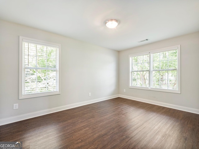 9701 Davis St, Braselton, GA 30517 - unfurnished room featuring dark wood finished floors and baseboards