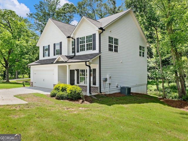 9701 Davis St, Braselton, GA 30517 - traditional-style home featuring concrete driveway, covered porch, an attached garage, and a front lawn