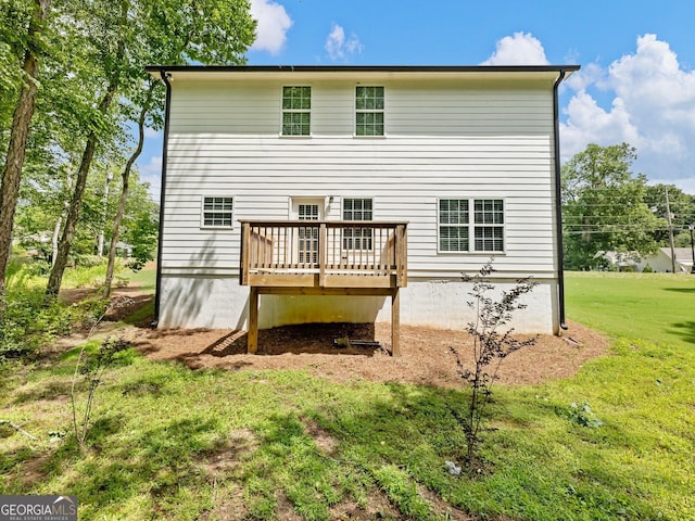 9701 Davis St, Braselton, GA 30517 - rear view of house featuring a deck and a lawn
