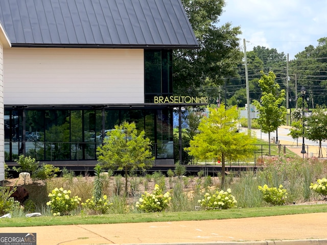 9701 Davis St, Braselton, GA 30517 - exterior view of a standing seam roof and a metal roof