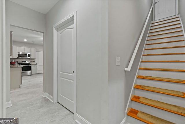 281 Hightower Lake Trl, Ball Ground, GA 30107 - stairs with baseboards