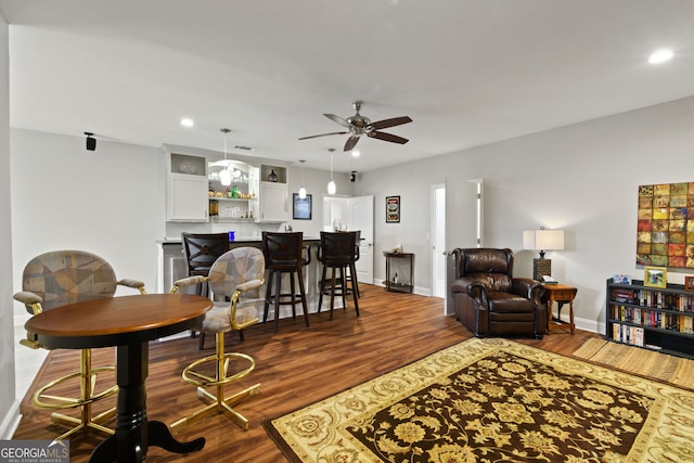 281 Hightower Lake Trl, Ball Ground, GA 30107 - living area with ceiling fan, dark wood-style flooring, recessed lighting, and bar