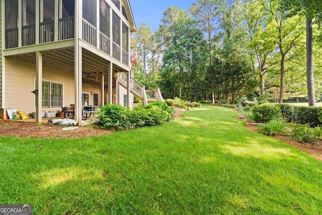 281 Hightower Lake Trl, Ball Ground, GA 30107 - view of green lawn with a patio area, a sunroom, and stairs