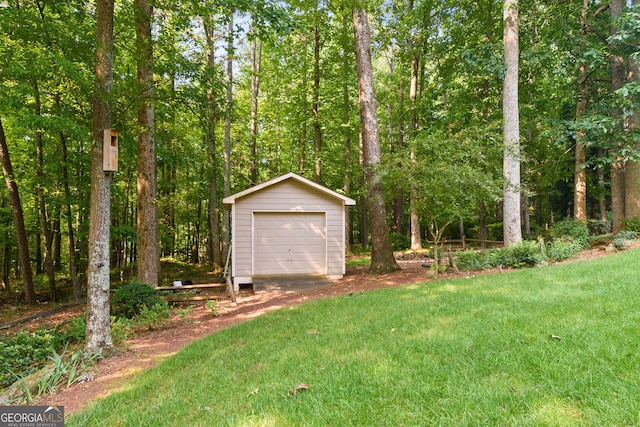 281 Hightower Lake Trl, Ball Ground, GA 30107 - view of green lawn featuring a detached garage and an outdoor structure