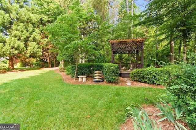281 Hightower Lake Trl, Ball Ground, GA 30107 - view of grassy yard featuring a pergola and a deck