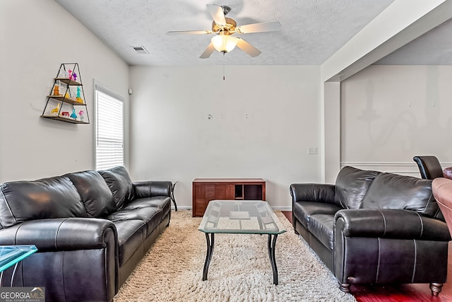 2555 Flat Shoals Rd Apt 2006, South Fulton, GA 30349 - living area with a textured ceiling and a ceiling fan