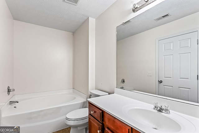 2555 Flat Shoals Rd Apt 2006, South Fulton, GA 30349 - full bathroom featuring vanity, a tub, and a textured ceiling