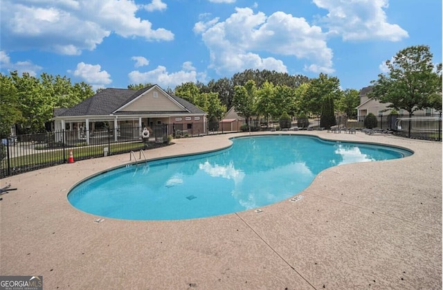 2555 Flat Shoals Rd Apt 2006, South Fulton, GA 30349 - community pool with a patio