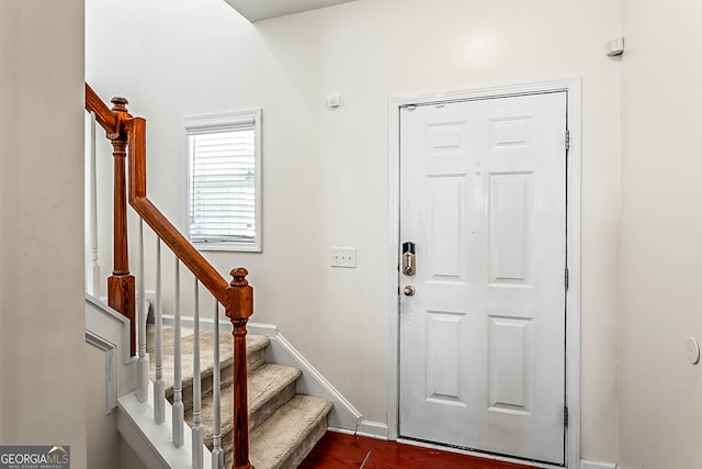 2555 Flat Shoals Rd Apt 2006, South Fulton, GA 30349 - entrance foyer with stairway and dark wood-style flooring
