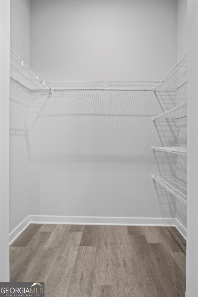 569 Middle St SW, Atlanta, GA 30310 - walk in closet with wood finished floors