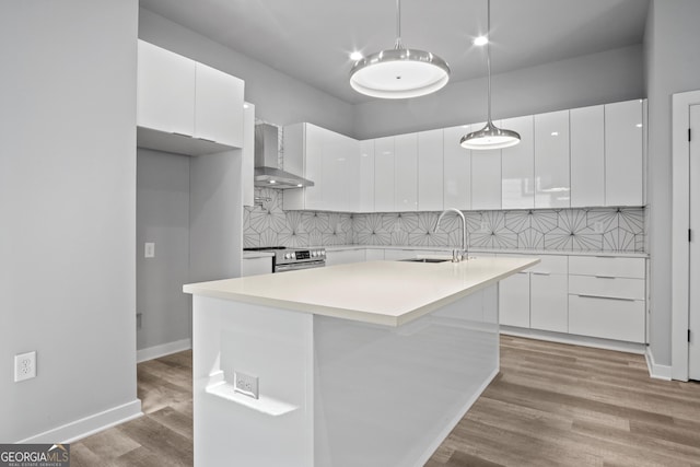 569 Middle St SW, Atlanta, GA 30310 - kitchen featuring wall chimney exhaust hood, modern cabinets, and white cabinetry