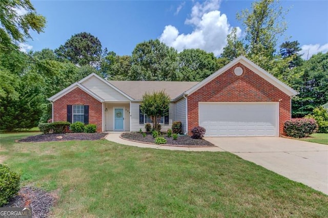 738 Baskins, Winder, GA 30680 - ranch-style house with brick siding, an attached garage, driveway, and a front lawn