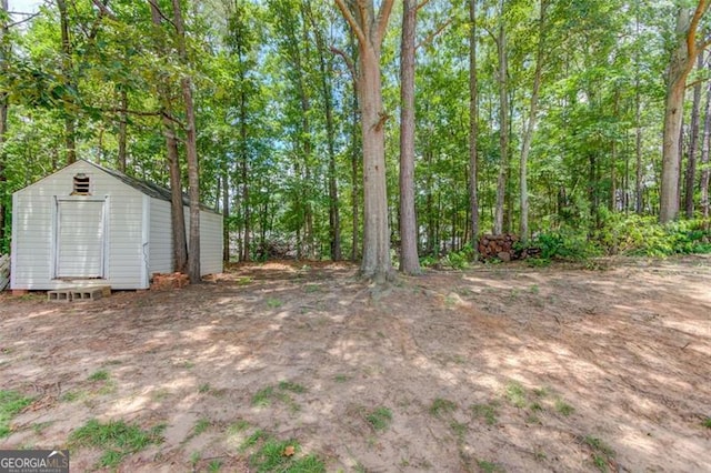 738 Baskins, Winder, GA 30680 - view of yard with a storage unit