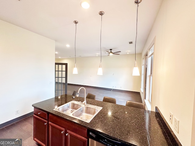 1195 Milton Ter Unit 5204, Atlanta, GA 30315 - kitchen with dark brown cabinets, a ceiling fan, dishwasher, hanging light fixtures, and recessed lighting