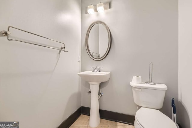 1195 Milton Ter Unit 5204, Atlanta, GA 30315 - half bath featuring toilet and tile patterned flooring