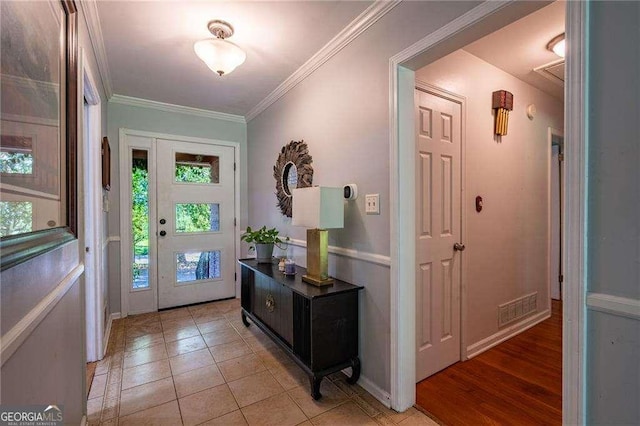 3300 Wiltshire Dr, Avondale Estates, GA 30002 - entrance foyer with ornamental molding and light tile patterned floors