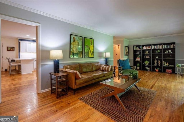 3300 Wiltshire Dr, Avondale Estates, GA 30002 - living room featuring light wood-style floors and ornamental molding