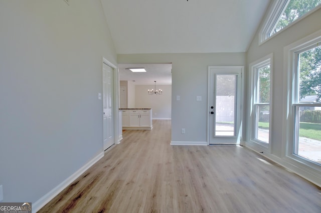 110 Chesterfield Ct, Fayetteville, GA 30214 - interior space featuring a chandelier, light wood-style floors, and high vaulted ceiling