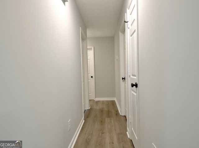 110 Chesterfield Ct, Fayetteville, GA 30214 - hall with light wood-style floors and baseboards