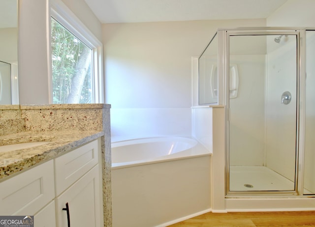 110 Chesterfield Ct, Fayetteville, GA 30214 - full bath with a stall shower, wood finished floors, vanity, and a bath