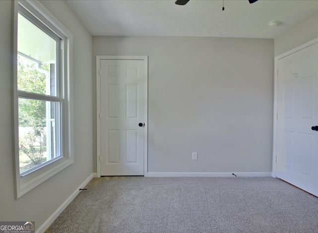 110 Chesterfield Ct, Fayetteville, GA 30214 - unfurnished room with light carpet, healthy amount of natural light, and ceiling fan
