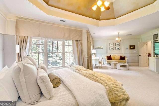 2230 Cambridge Hill Ct, Dacula, GA 30019 - bedroom with ornamental molding, light carpet, a chandelier, and a decorative wall