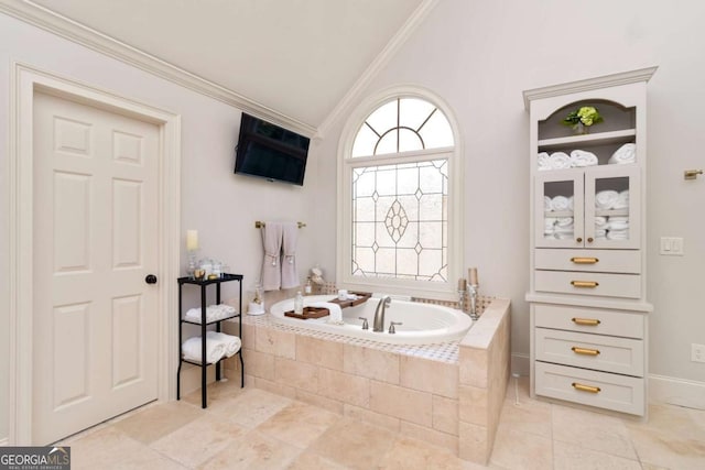 2230 Cambridge Hill Ct, Dacula, GA 30019 - full bathroom featuring ornamental molding, vaulted ceiling, a garden tub, and tile patterned flooring