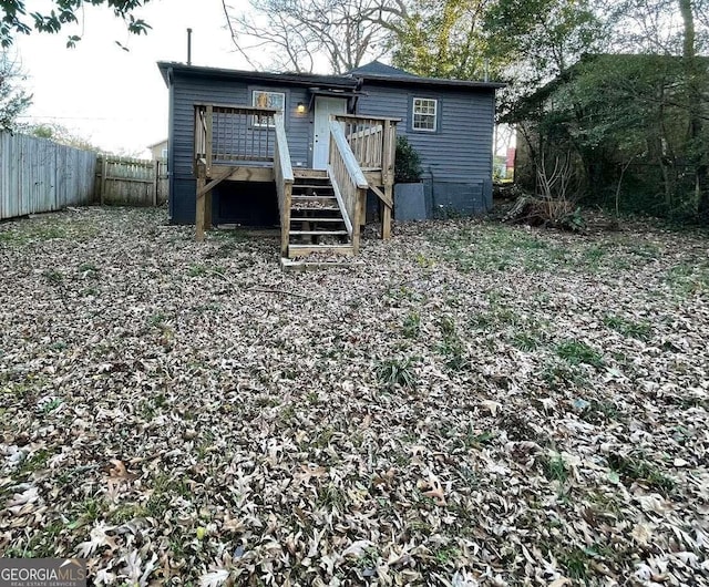 535 Walnut St, Hapeville, GA 30354 - rear view of house featuring a wooden deck and stairs