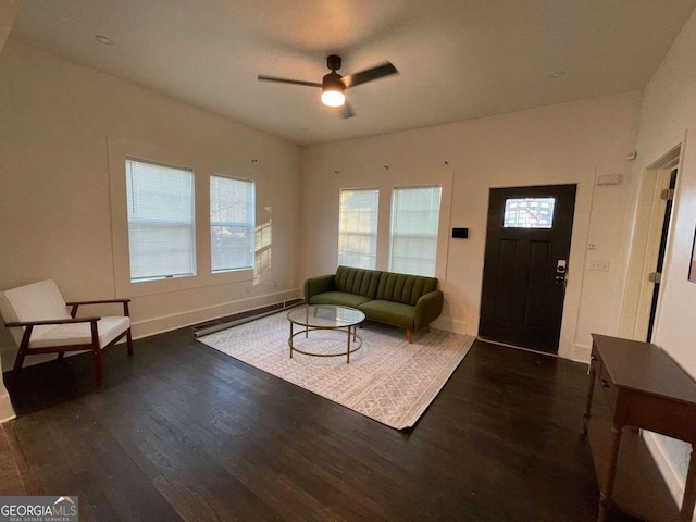 535 Walnut St, Hapeville, GA 30354 - living area featuring dark wood-style flooring and a ceiling fan