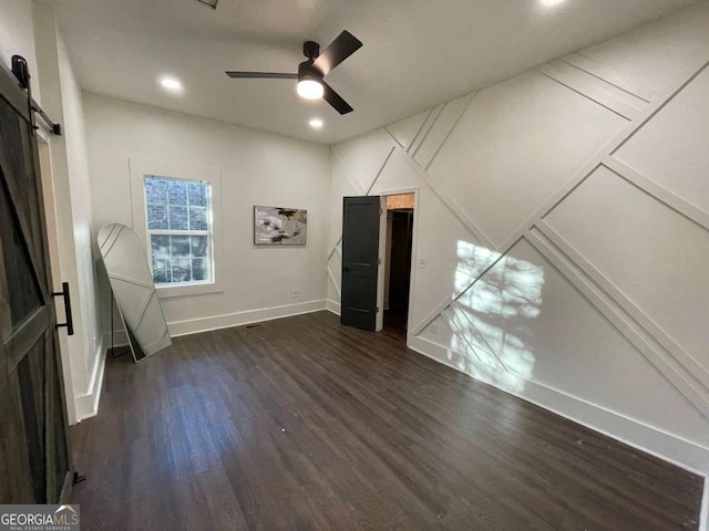 535 Walnut St, Hapeville, GA 30354 - unfurnished living room with a barn door, dark wood-type flooring, a ceiling fan, and recessed lighting
